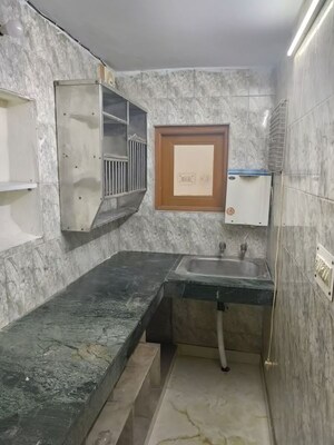 Kitchen in 4 BHK Apartment at Shalimar Bagh – for Sale