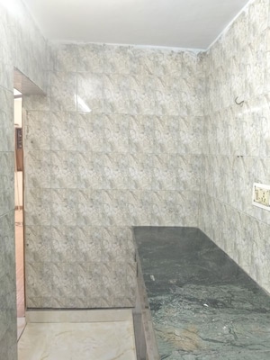 Kitchen in 4 BHK Apartment at Shalimar Bagh – for Sale