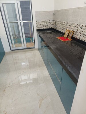 Kitchen in 2 BHK Apartment at Mahavir Square, Manpada – for Rent