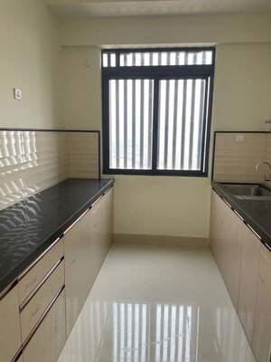 Kitchen in 2 BHK Apartment at Dynamix Divum, Malad East – for Rent