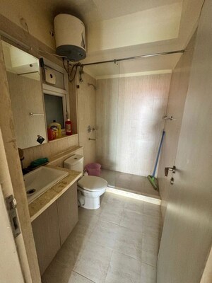 Bathroom in 3 BHK Apartment at DLF The Skycourt, Sector 86 – for Rent