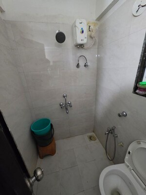 Bathroom in 1 BHK Apartment at DGS Sheetal Tapovan, Malad East – for Rent