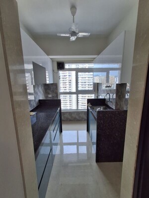 Kitchen in 1 BHK Apartment at Group Satellite Elegance, Goregaon East – for Rent