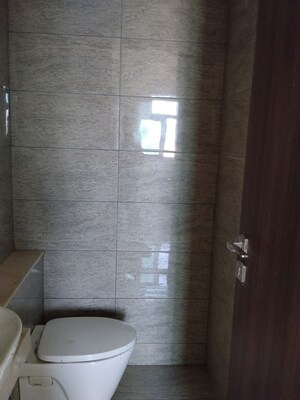 Bathroom in 2 BHK Apartment at Sheth Auris Serenity Tower 3, Malad West – for Rent