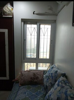 Bedroom in 1.5 BHK Apartment at Dosti Oak, Balkum Pada – for Rent