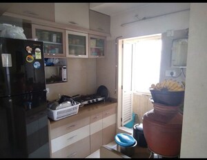 Kitchen in 1.5 BHK Apartment at Dosti Oak, Balkum Pada – for Rent