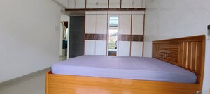 Bedroom in 2 BHK Apartment at Akshar Alvario, Seawoods – for Rent