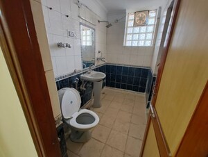 Bathroom in 3.5 BHK Apartment at Gurugram CGHS, Sector 56 – for Rent