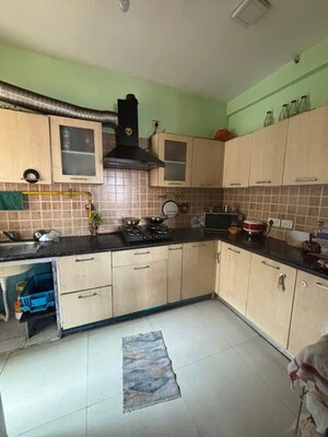 Kitchen in 3 BHK Apartment at Mahagun My Woods, Sector 16c Greater Noida – for Rent