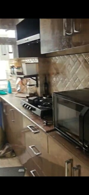 Kitchen in 2 BHK Apartment at Amrapali Leisure Park, Amrapali Leisure Valley – for Rent