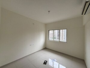 Room in 2 BHK Apartment at Omkar Signet, Malad East – for Rent