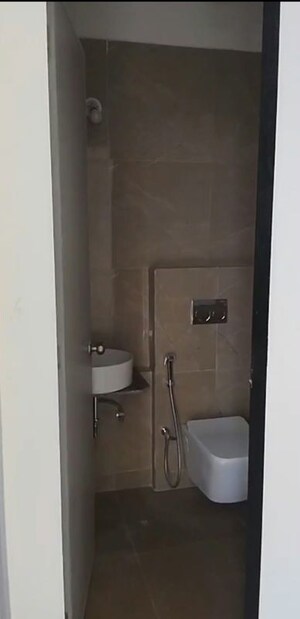 Bathroom in 2 BHK Apartment at Dhamji Shamji Mahavir Spring Tulip Phase 1, Pokhran Road No Two – for Rent
