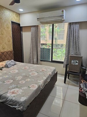 Bedroom in 2 BHK Apartment at S Raheja Natraj, Khar West – for Rent