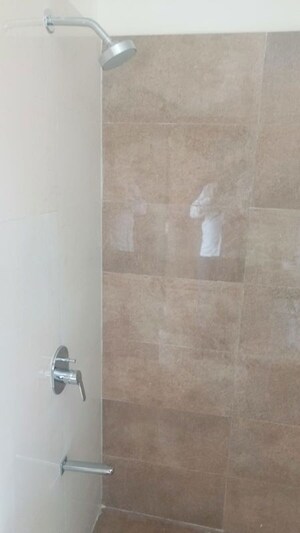 Bathroom in 2 BHK Apartment at Omkar Signet, Malad East – for Rent
