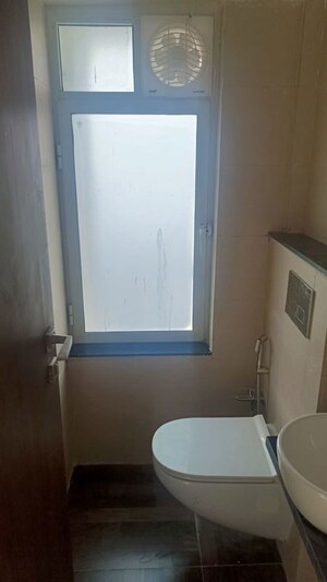 Bathroom in 2 BHK Apartment at Omkar Signet, Malad East – for Rent