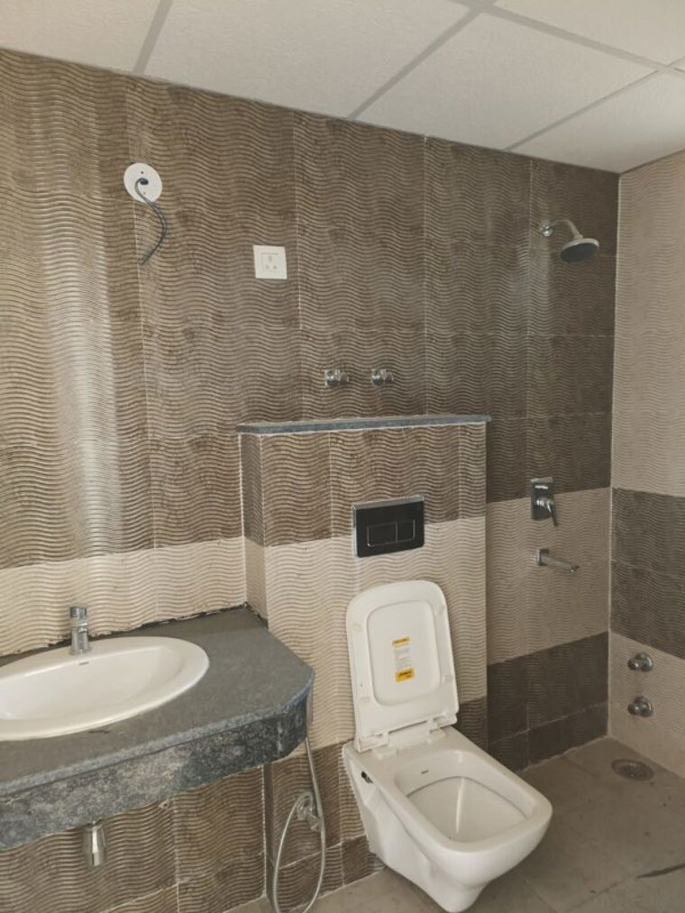 Bathroom, signature-global-grand-iva 2 Bedroom 716 Sq.Ft. Apartment In Sector 103 Gurgaon 10737590