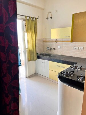 Kitchen in 2 BHK Apartment at Bankey Bihari Aggarwal Heights, Raj Nagar Extension – for Rent
