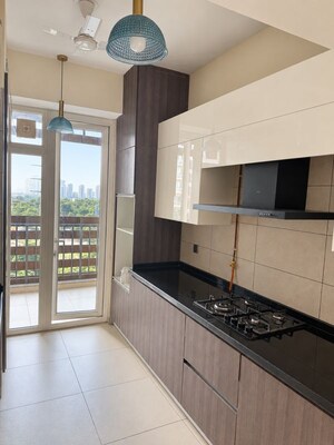 Kitchen in 3.5 BHK Apartment at Mahindra Luminare, Sector 59 – for Rent
