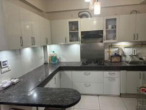 Kitchen in 3 BHK Apartment at Panchsheel Greens, Sector 16 Greater Noida – for Rent