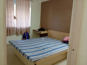 Bedroom in 2 BHK Apartment at Nivedita Sanyogita CHS, Vile Parle East – for Rent