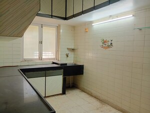 Kitchen in 2 BHK Apartment at Ram Janki Apartment, Vile Parle East – for Rent