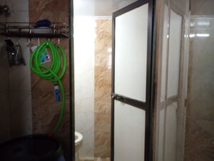 Bedroom in 1 RK Apartment at Neel Laxmi CHS, Vile Parle East – for Rent