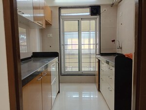 Kitchen in 1 BHK Apartment at Panom Park, Vile Parle East – for Sale