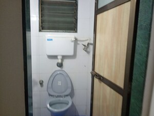 Bathroom in 1 BHK Apartment at Sun & Breeze Apartment, Vile Parle East – for Rent