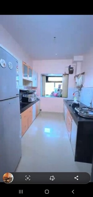 Kitchen in 3 BHK Apartment at Maharaja Retreat CHS, Goregaon East – for Sale