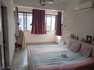 Bedroom in 3 BHK Apartment at Ashokraj CHS, Goregaon West – for Rent