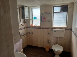 Bathroom in 3 BHK Apartment at Ashokraj CHS, Goregaon West – for Rent