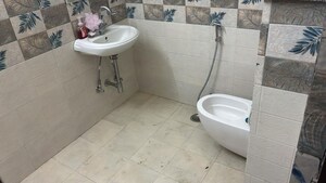 Bathroom in 4 BHK Apartment at Purvanchal Royal City, Chi V Greater Noida – for Rent