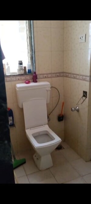 Bathroom in 2 BHK Apartment at Omkar CHS, Parel – for Rent