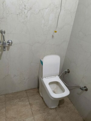 Bathroom in Studio Apartment at Purvanchal Royal City, Chi V Greater Noida – for Rent