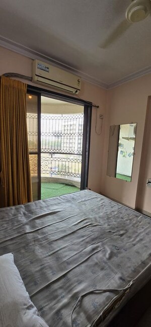Room in 2 BHK Apartment at Shree Ambika Complex, Ghansoli – for Rent