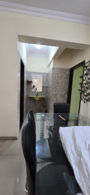 Living Room in 2 BHK Apartment at Shree Ambika Complex, Ghansoli – for Rent