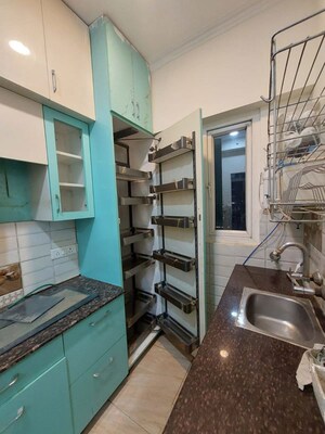 Kitchen in 2 BHK Apartment at Gaur City 2 - 14th Avenue, Sector 16c Greater Noida – for Rent