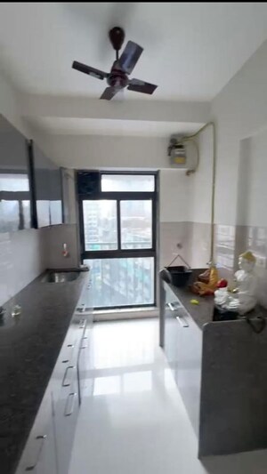 Kitchen in 2 BHK Apartment at Parinee Essence, Kandivali West – for Rent