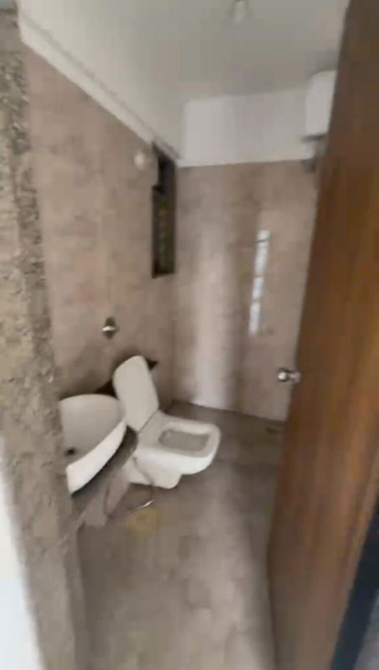 Bathroom, parinee-essence 2 Bedroom 558 Sq.Ft. Apartment In Kandivali West Mumbai 10738611