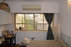 Bedroom in 2 BHK Apartment at Breezy Heights, Bandra West – for Rent