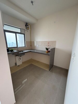 Kitchen in 2 BHK Apartment at Piramal Vaikunth, Balkum Pada – for Rent