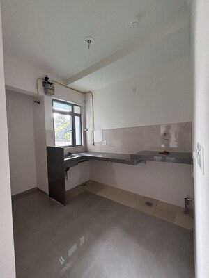 Kitchen in 1 BHK Apartment at Piramal Vaikunth, Balkum Pada – for Rent