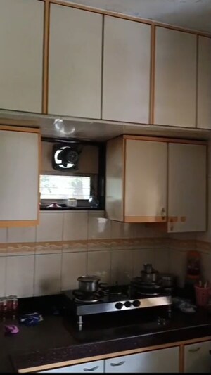 Kitchen in 1 BHK Apartment at Sheetal Apartment Vile Parle, Vile Parle East – for Rent