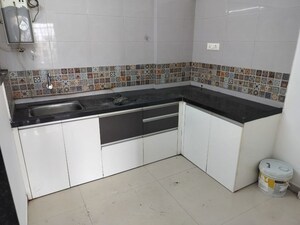 Kitchen in 2 BHK Apartment at Choice Goodwill Valencia, Dhanori – for Rent