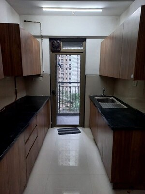 Kitchen in 2.5 BHK Apartment at Lodha Splendora Platino, Ghodbunder Road – for Sale
