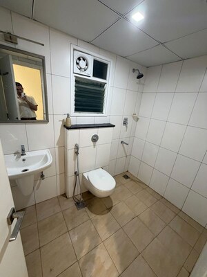 Bathroom in 2 BHK Apartment at Godrej Aqua, International Airport Road – for Rent