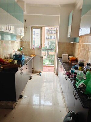 Kitchen in 2 BHK Apartment at Aims Golf City, Sector 75 – for Rent