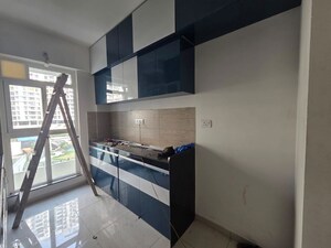 Kitchen in 2 BHK Apartment at Godrej Emerald, Ghodbunder Road – for Rent