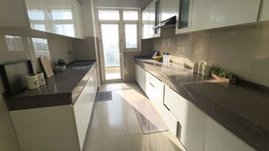 Kitchen in 3 BHK Apartment at Emaar Palm Gardens, Sector 83 – for Sale