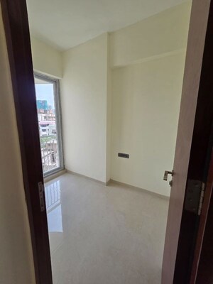 Room in 2 BHK Apartment at Ruparel Sky Green, Kandivali West – for Sale